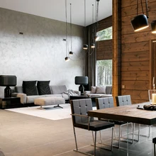 Kaminatuld saab imetleda nii elutoa diivanil kui ka söögilaua taga istudes.